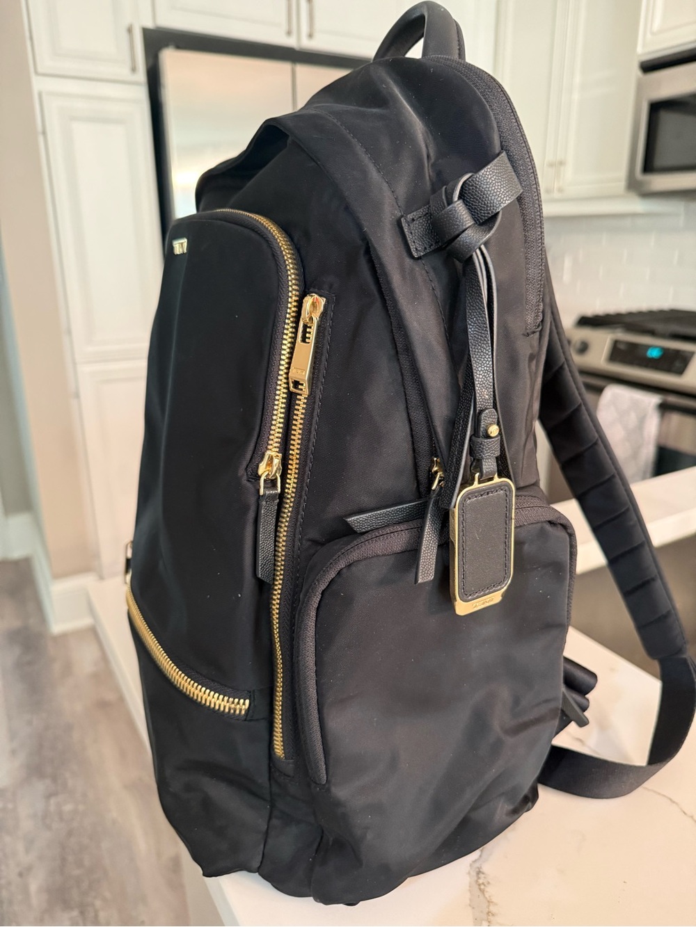 TUMI Black Nylon Voyageur Celina Backpack with Gold Hardware good condition - Picture 2 of 5